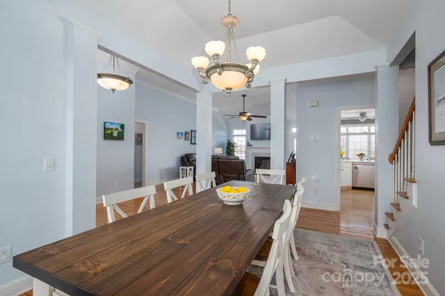 a kitchen with stainless steel appliances a microwave sink stove refrigerator and cabinets