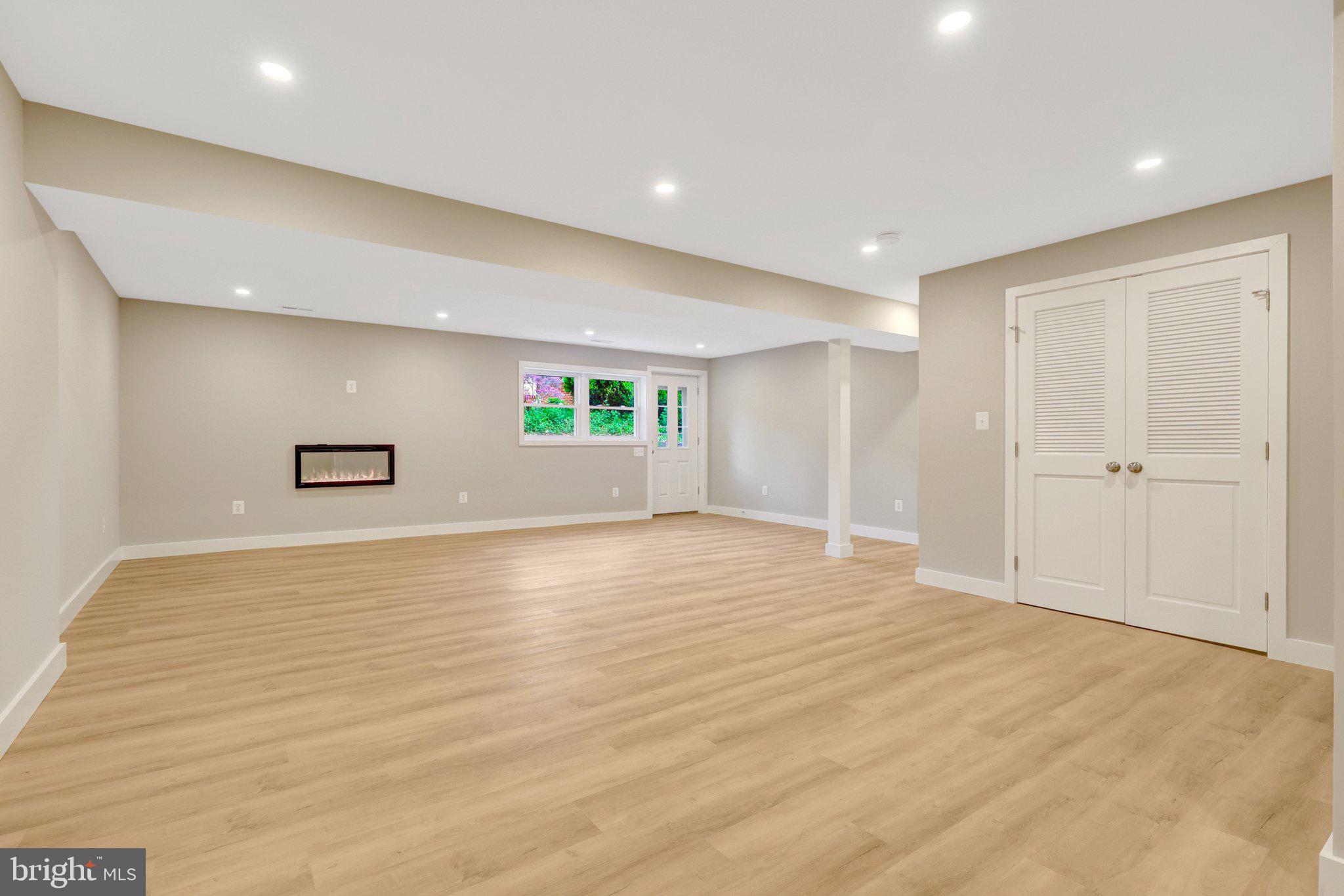 3503 Spring Lake Terrace Fairfax, VA 22030 - Photo 24 of 48 To A Huge Rec Room With Another Electric Fireplace