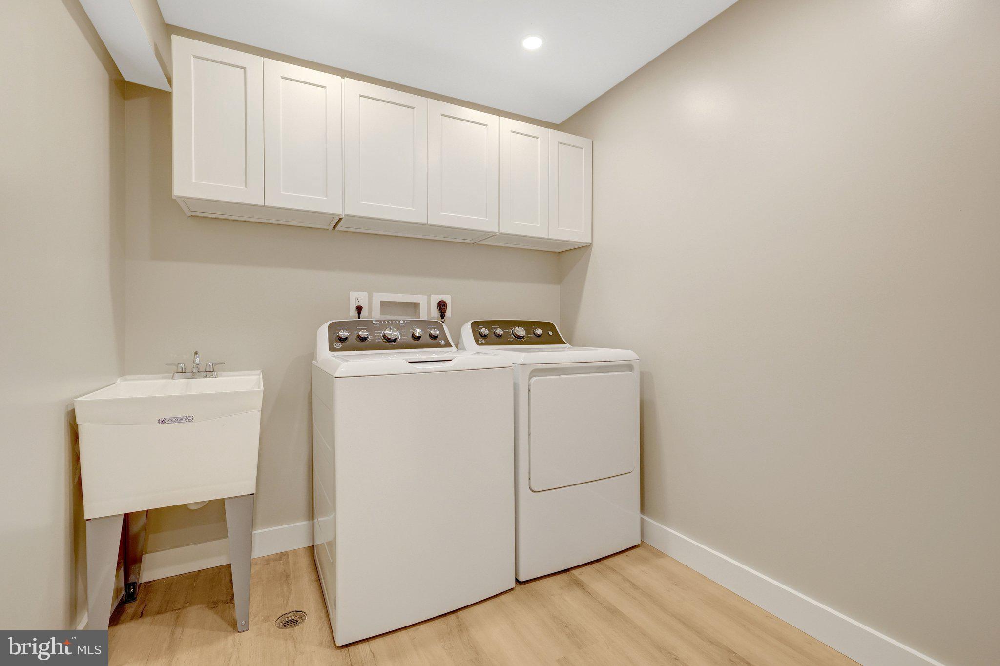 3503 Spring Lake Terrace Fairfax, VA 22030 - Photo 26 of 48 Spacious Laundry Room Has Extra Storage & Cabinets
