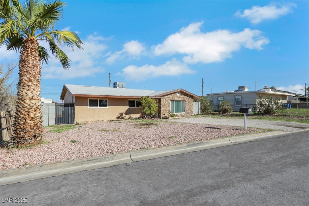 11 California Way Henderson, NV 89015 - Photo 2 of 17 Single story home featuring stucco siding and stone siding