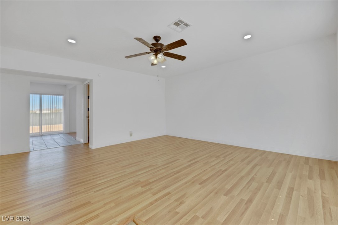 11 California Way Henderson, NV 89015 - Photo 4 of 17 Empty room with recessed lighting, light wood finished floors, and ceiling fan