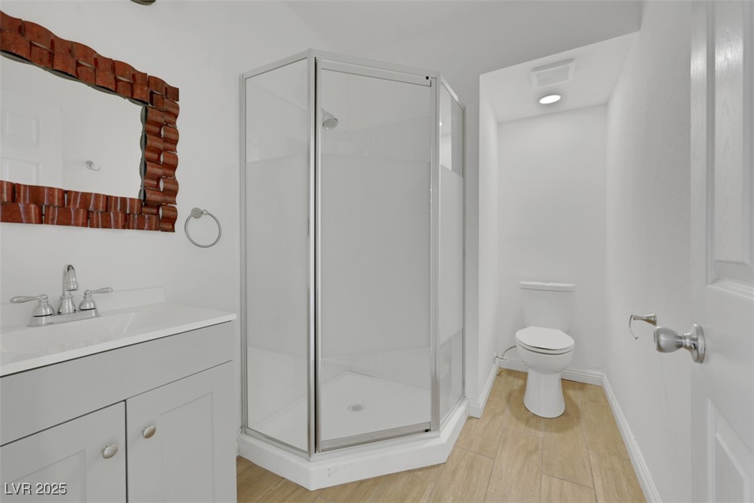 11 California Way Henderson, NV 89015 - Photo 5 of 17 Bathroom with vanity and a shower stall