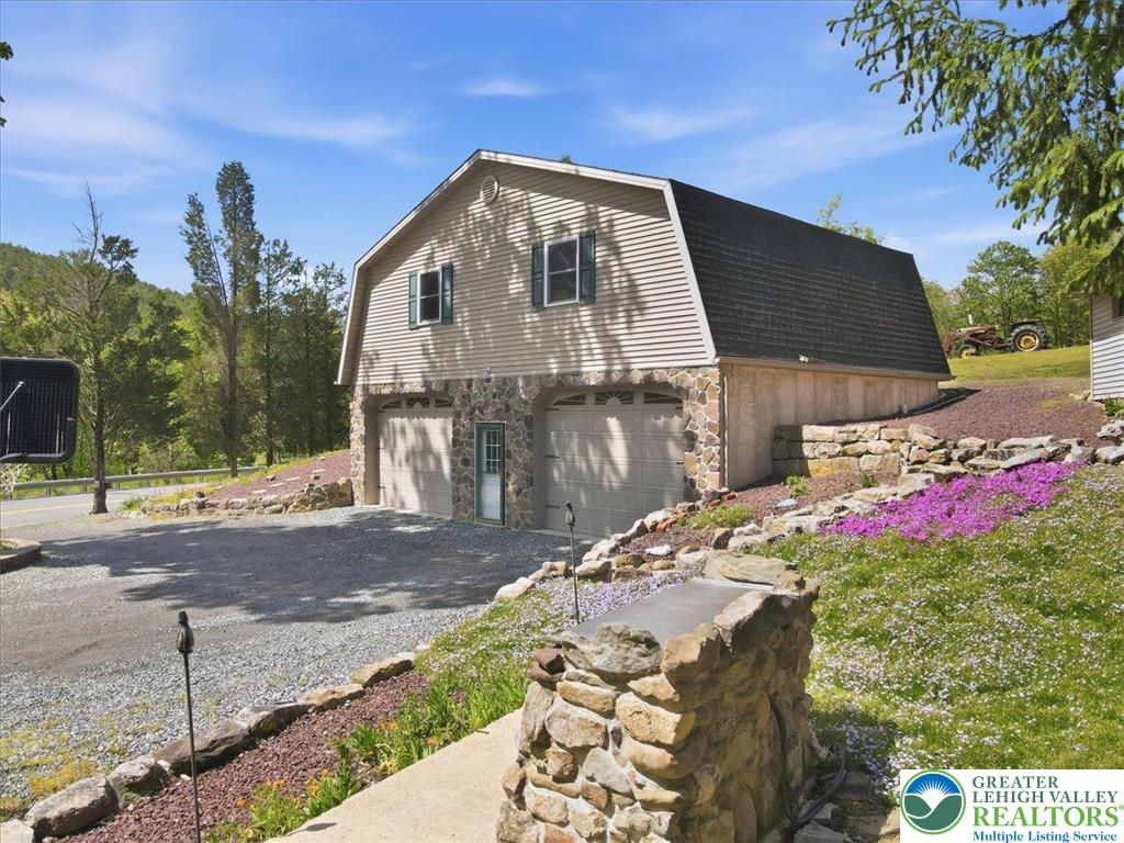 4880 Little Gap Road Kunkletown, PA 18058 - Photo 55 of 100 This charming detached garage with stone accents offers ample parking and storage.