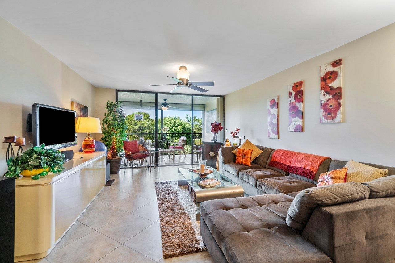 6562 Boca Del Mar Drive, Unit 524 Boca Raton, FL 33433 - Photo 13 of 37 Living Room opens to Sunshine