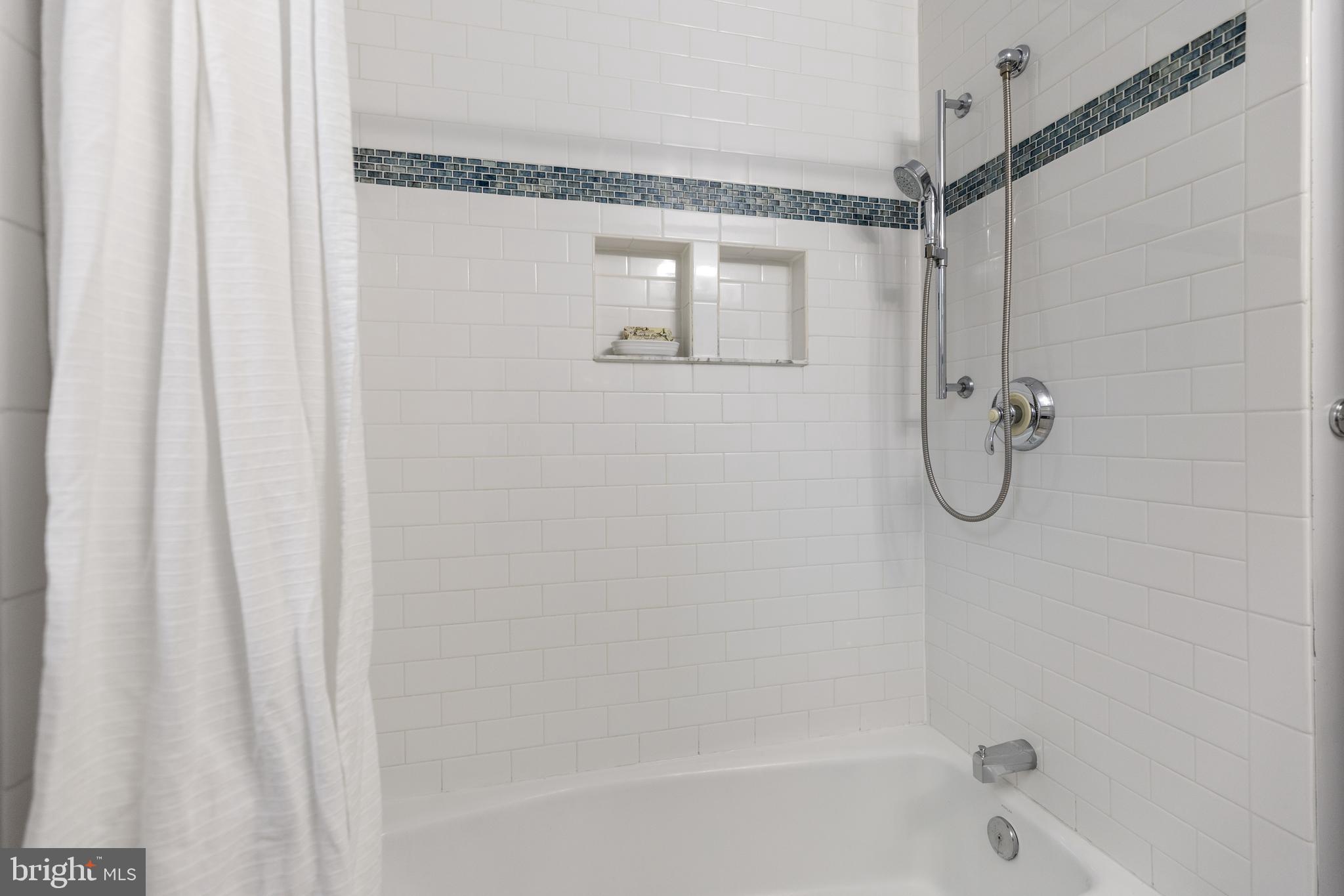 4628 31st Road South Arlington, VA 22206 - Photo 17 of 55 Custom tiled shower w/niche shelving & soaking tub