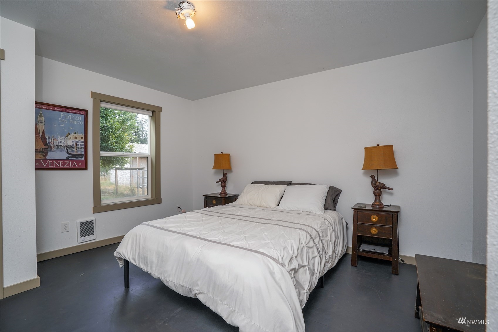10542 School Land Road Southwest Rochester, WA 98579 - Photo 28 of 40 a bedroom with a bed and window