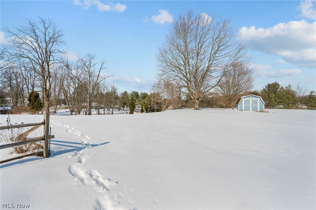 2099 Pontius Road Mogadore, OH 44260 - Photo 33 of 35 Yard layered in snow with snow