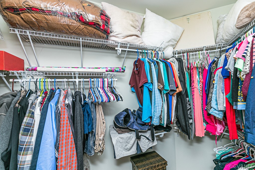 15195 Taylor Road Beaverdam, VA 23015 - Photo 26 of 45 a view of walk in closet with clothes and shoes