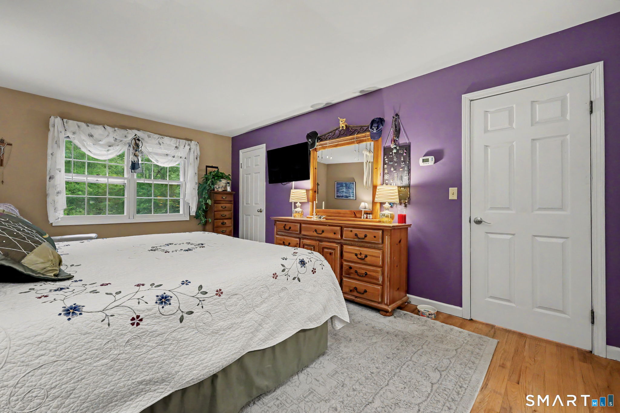 571 Wheeler Road Monroe, CT 06468 - Photo 23 of 40 a bedroom with a bed and a dresser