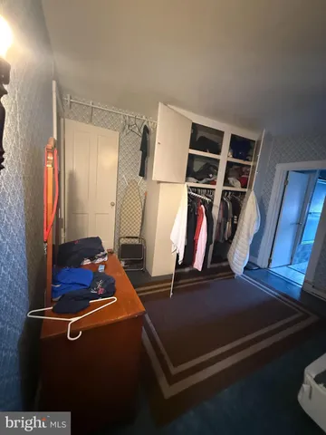 a bathroom with a toilet a sink and bathtub