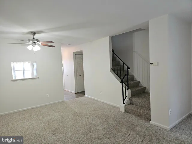 a view of balcony with wooden floor and outdoor seating