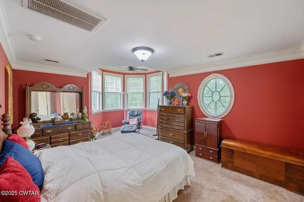 a room with furniture and a window