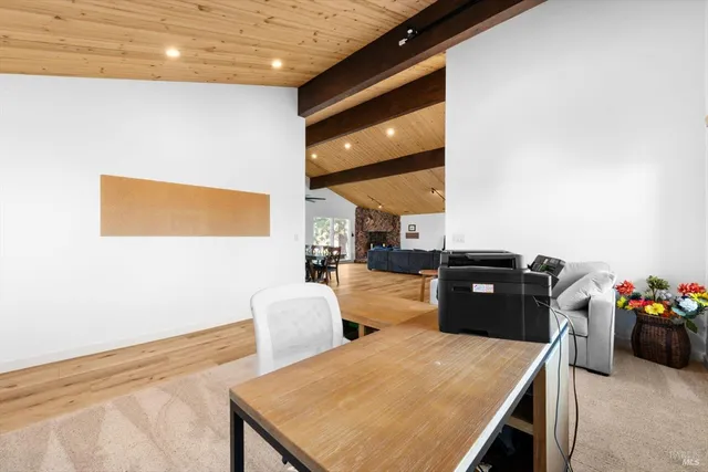 a view of a door and wooden floor