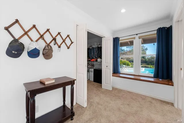 an aerial view of residential house with outdoor space and swimming pool