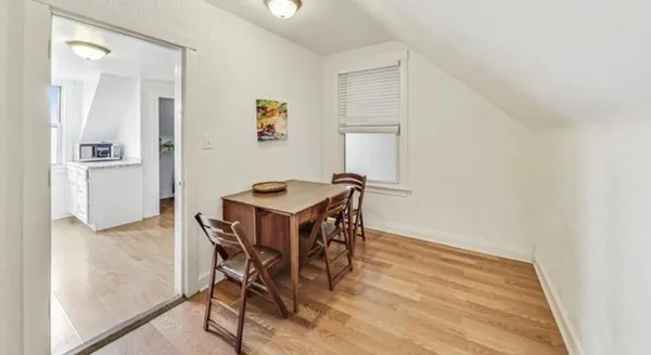 a view of a dining room with furniture