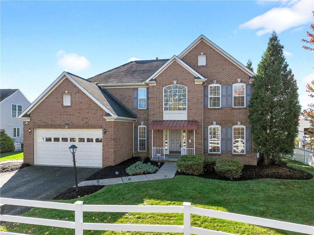 809 Wible Run Road Pittsburgh, PA 15209 - Photo 1 of 36 a front view of a house with a yard