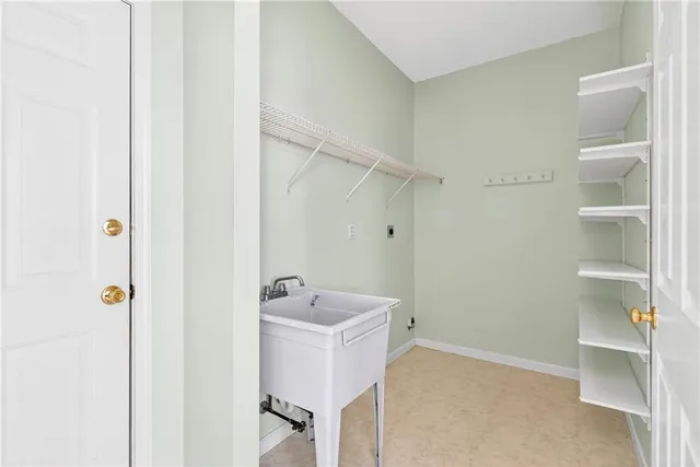 a bathroom with a sink and shower