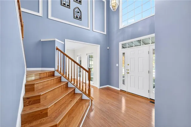 a view of entryway with wooden floor