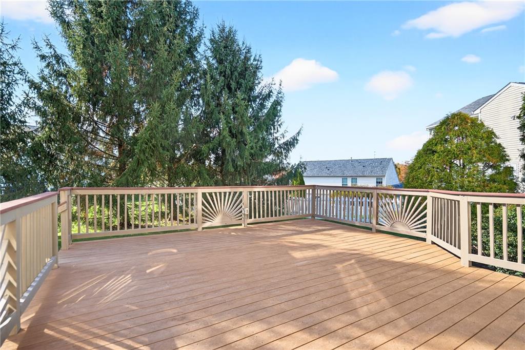809 Wible Run Road Pittsburgh, PA 15209 - Photo 33 of 36 a view of balcony with a small yard and wooden fence