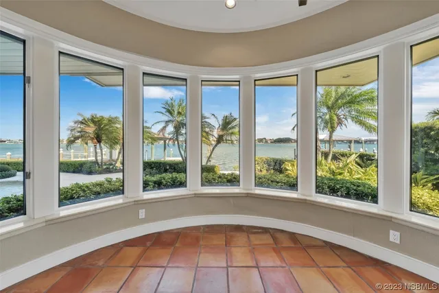 a view of a kitchen with a sink and a window