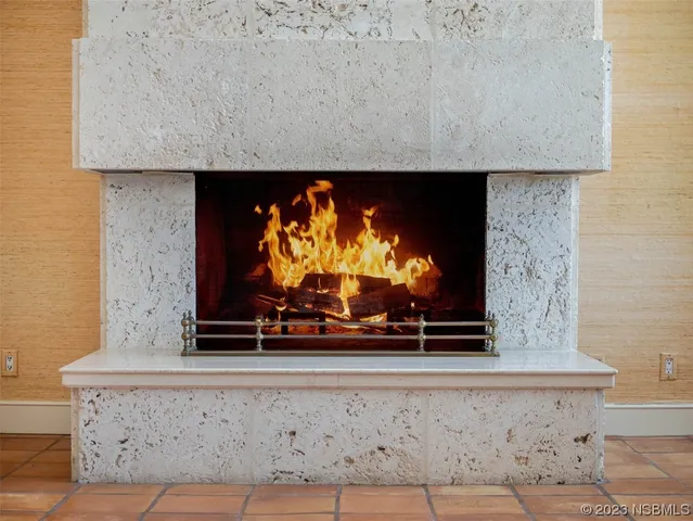 a view of an empty room with empty shelves