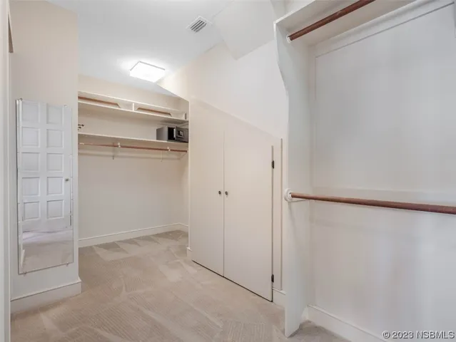 an aerial view of house with yard swimming pool and outdoor seating