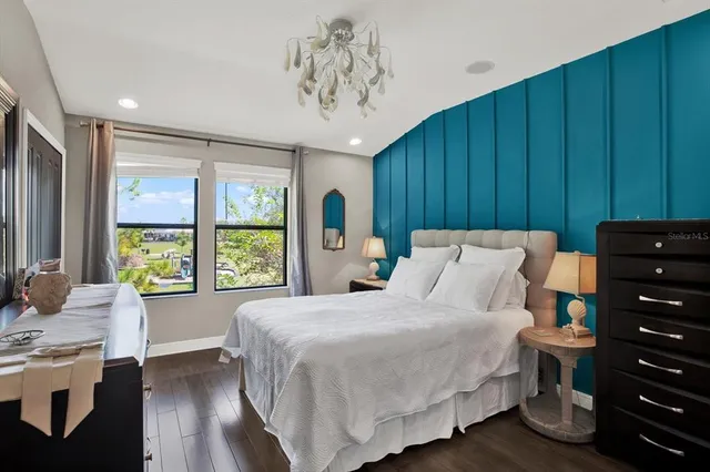 a bed room with a bed and a window