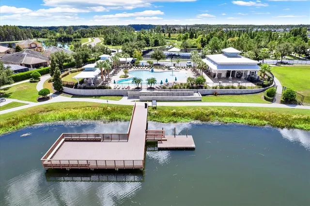 a view of a swimming pool with a lake view