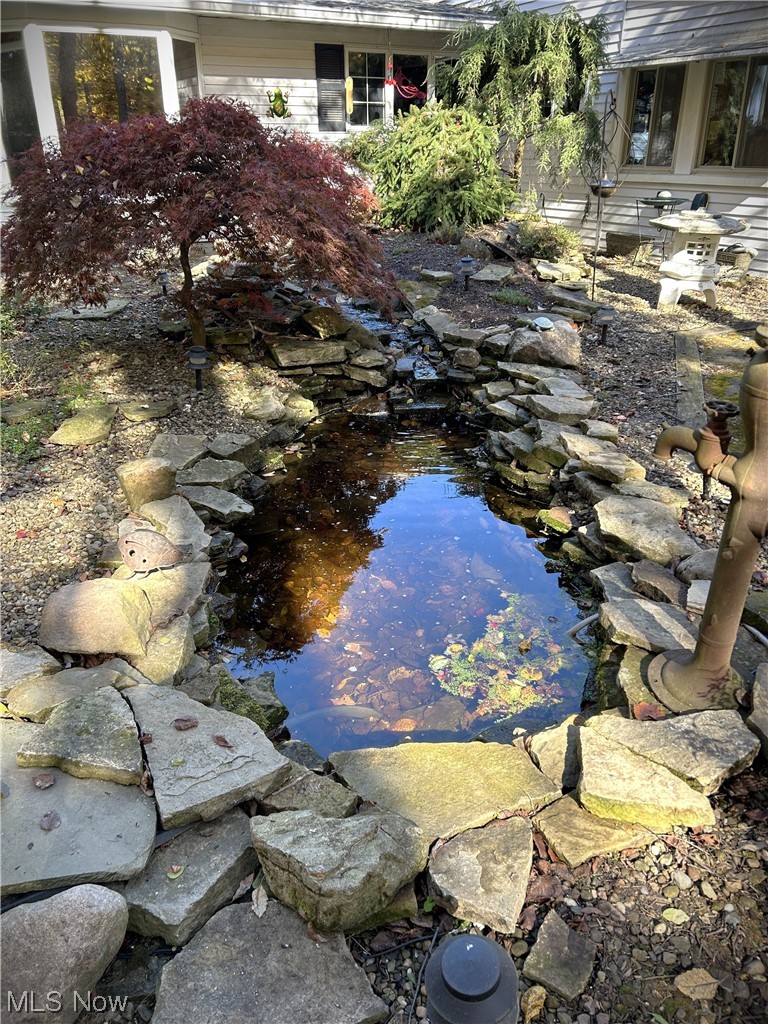 7855 Mulberry Road Chesterland, OH 44026 - Photo 37 of 46 View of pond with a water fall.
