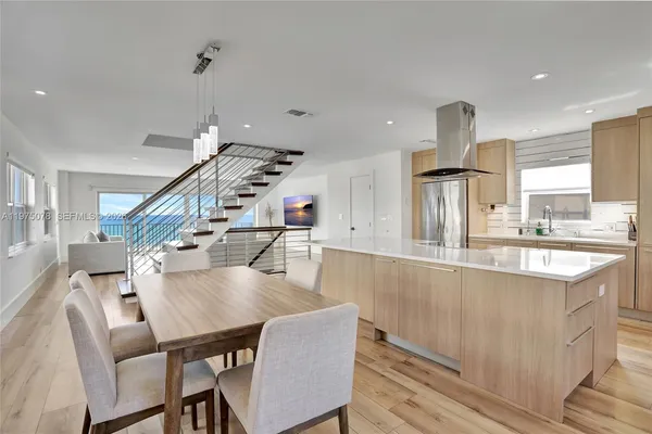 a kitchen with a stove and a sink