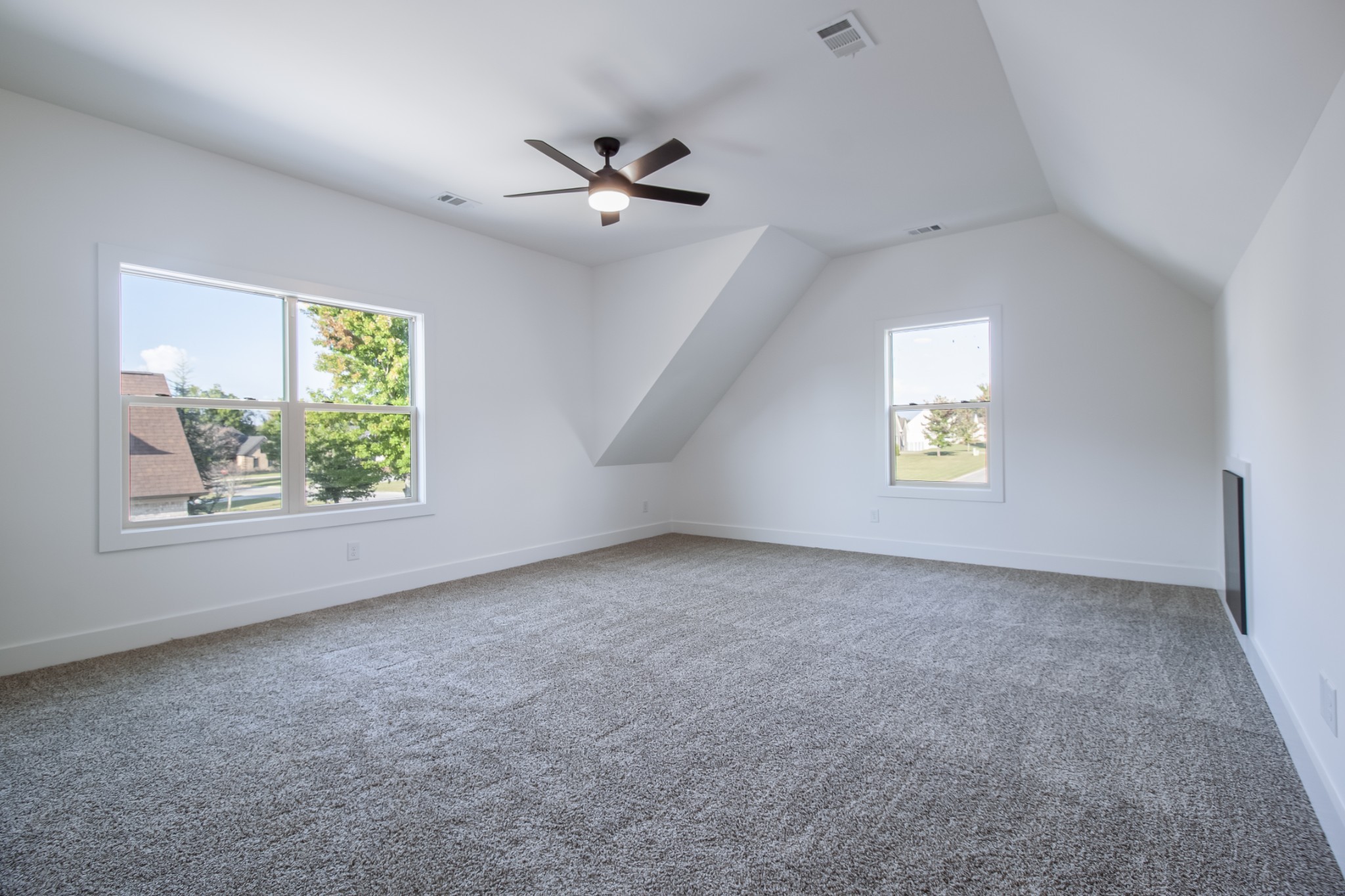835 Lexington Circle Manchester, TN 37355 - Photo 44 of 53 an empty room with windows and fan