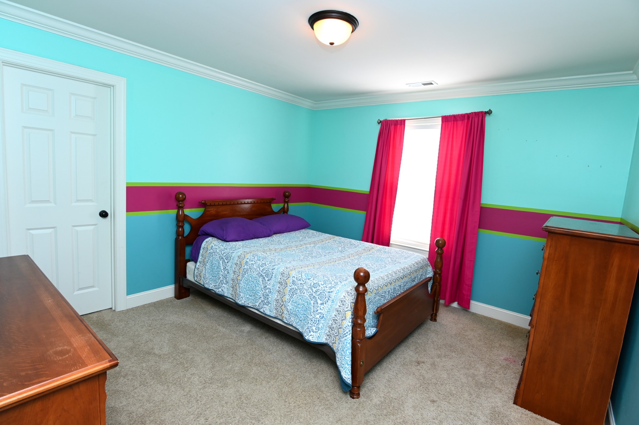 3103 Sakari Circle Spring Hill, TN 37174 - Photo 14 of 18 a bedroom with a bed and a dresser