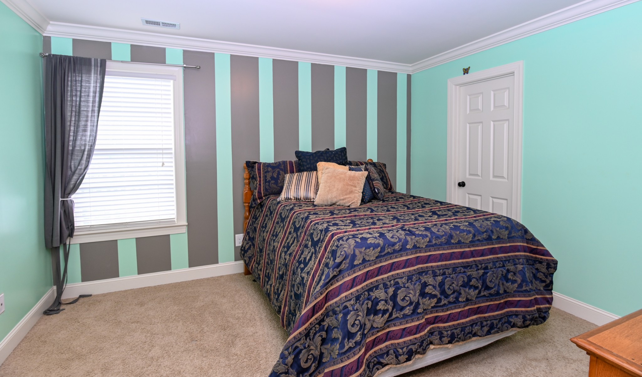 3103 Sakari Circle Spring Hill, TN 37174 - Photo 15 of 18 a bedroom with a large bed and a window