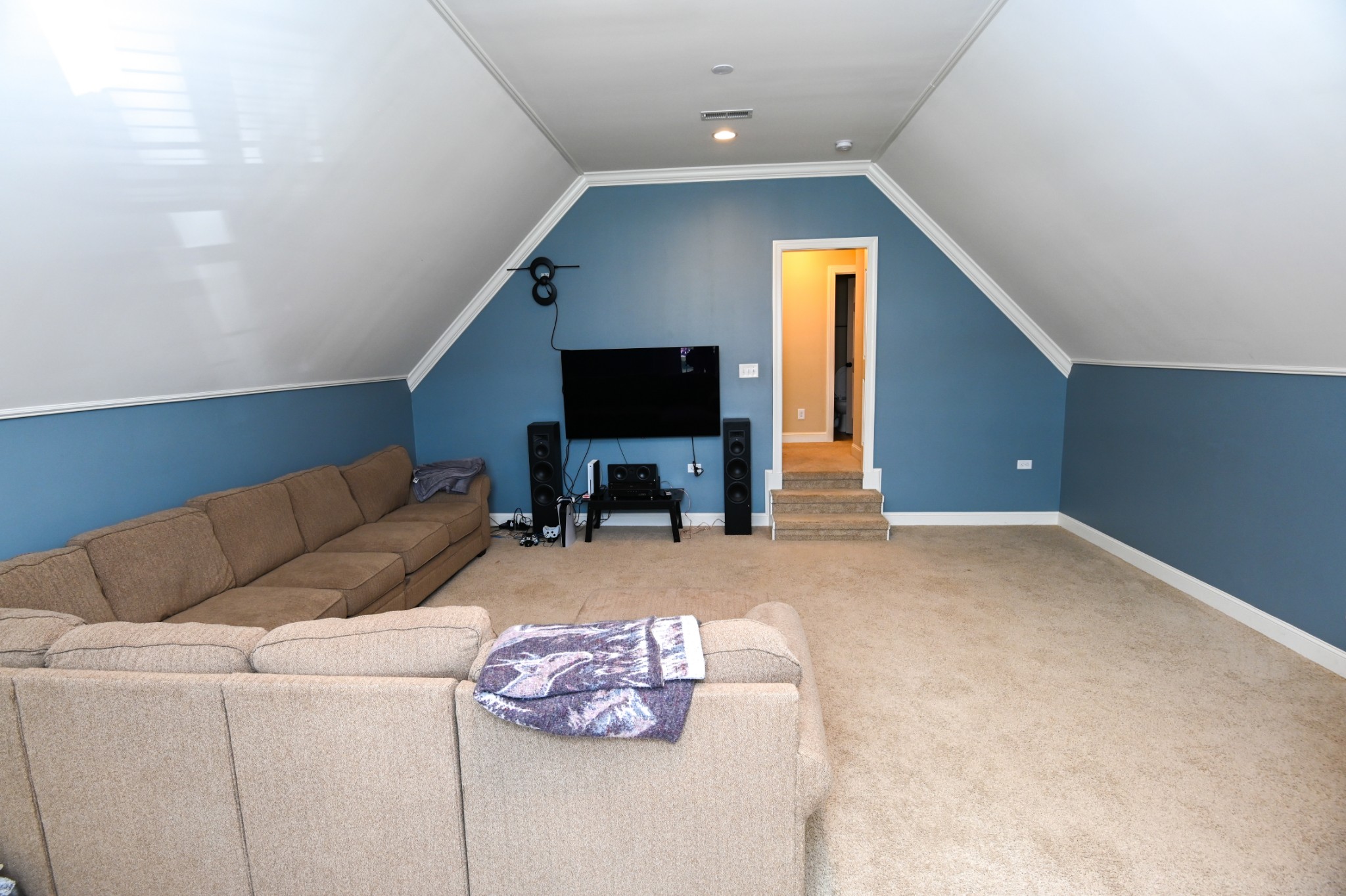 3103 Sakari Circle Spring Hill, TN 37174 - Photo 17 of 18 a living room with furniture and a flat screen tv