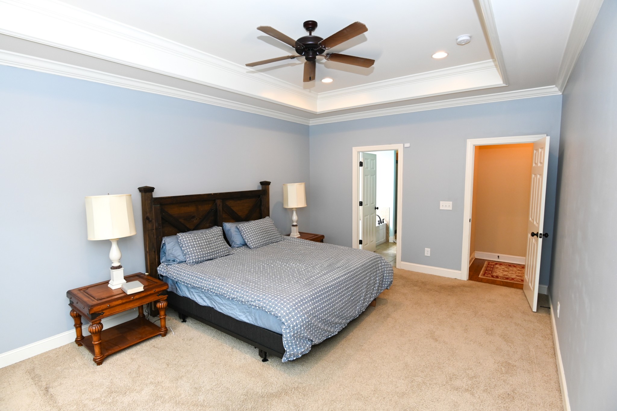 3103 Sakari Circle Spring Hill, TN 37174 - Photo 8 of 18 a bedroom with a bed and a lamp