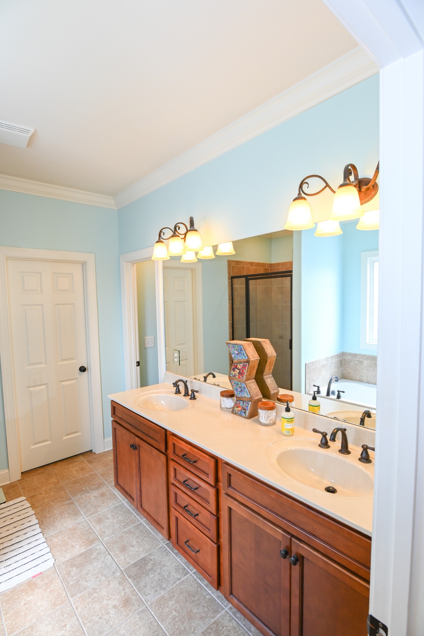 3103 Sakari Circle Spring Hill, TN 37174 - Photo 9 of 18 a bathroom with a sink double vanity