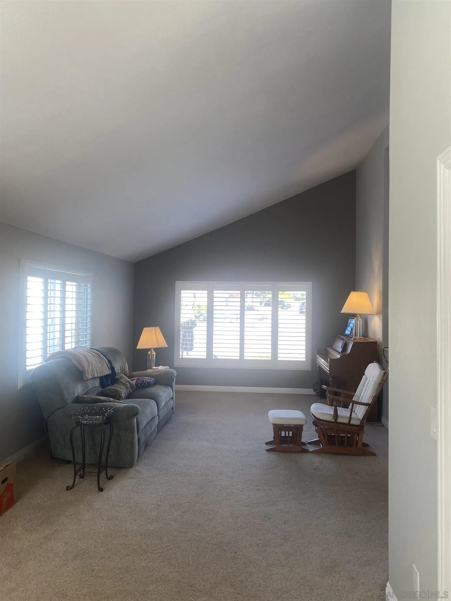10991 Hillcreek Road Santee, CA 92071 - Photo 5 of 26 a living room with furniture and a fireplace