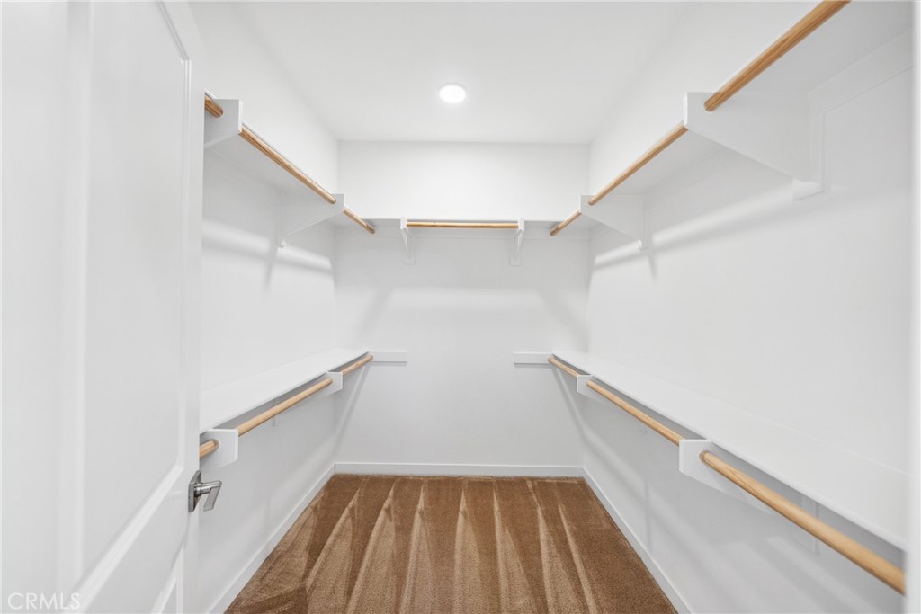 45037 Via Vela Temecula, CA 92592 - Photo 14 of 38 a view of an empty walk in closet