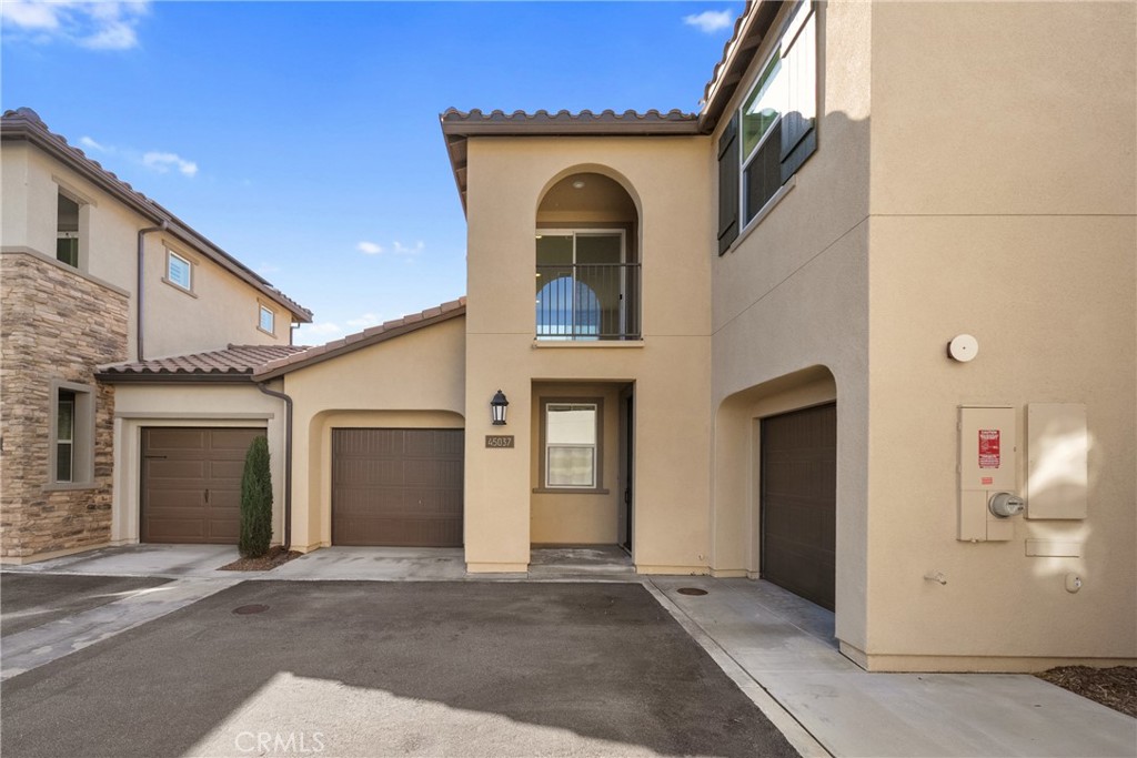 45037 Via Vela Temecula, CA 92592 - Photo 2 of 38 a view of a house with window and garage