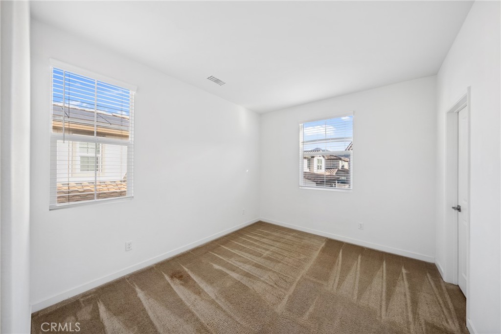 45037 Via Vela Temecula, CA 92592 - Photo 26 of 38 a view of an empty room with a window