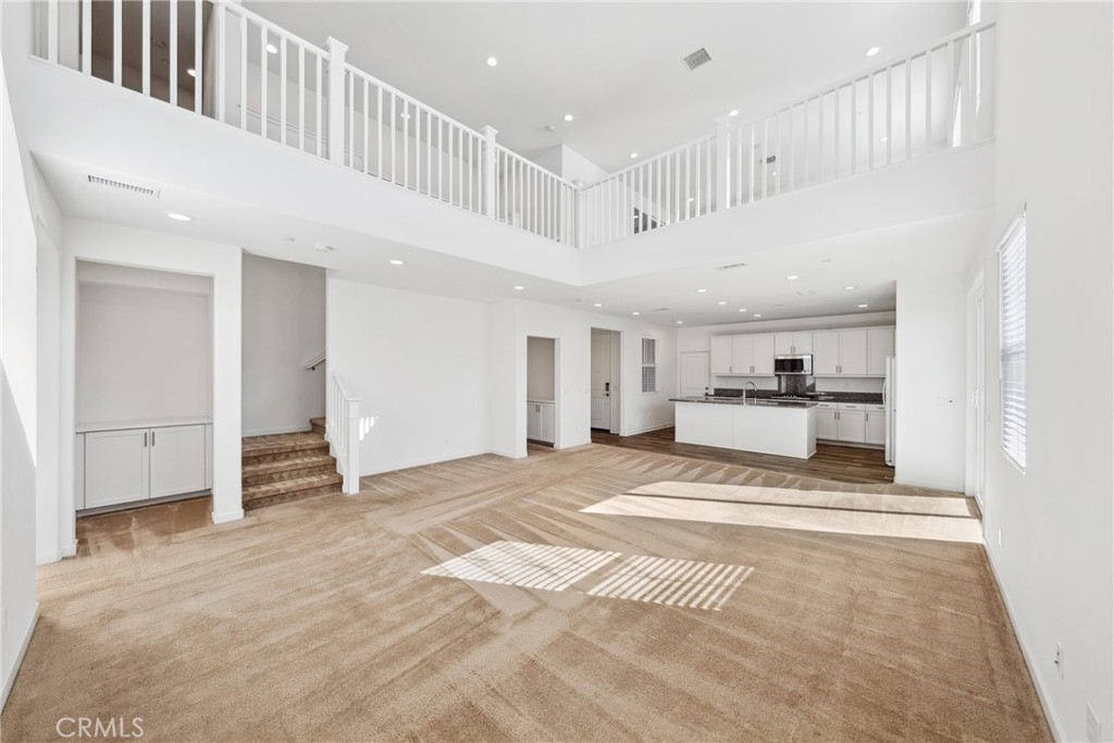 45037 Via Vela Temecula, CA 92592 - Photo 3 of 38 a view of a hallway with kitchen and entryway