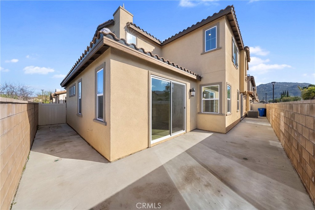 45037 Via Vela Temecula, CA 92592 - Photo 31 of 38 a view of a house with a backyard