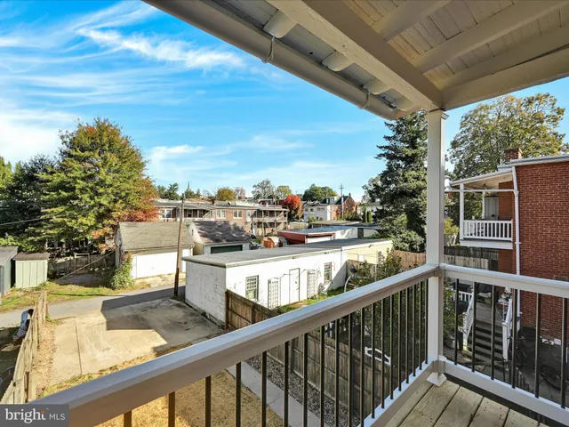 a view of a balcony with city view