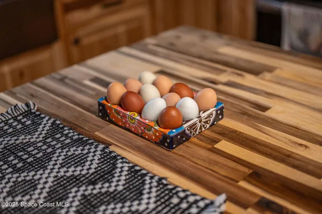 a bedroom with a bed and a table with closet