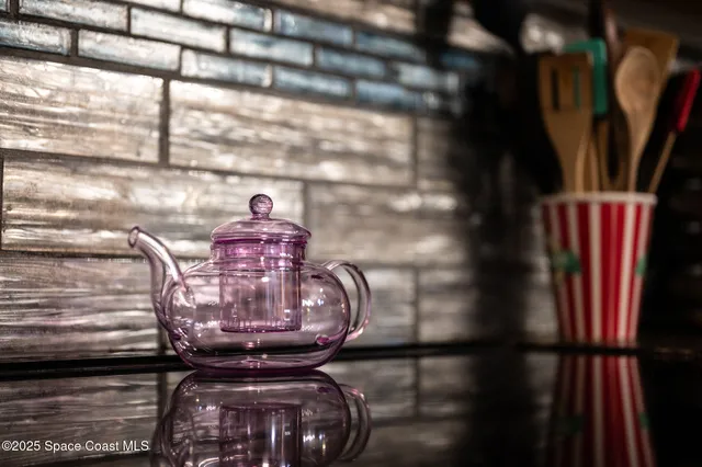 a bedroom with furniture and a flat screen tv