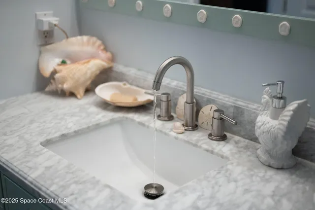 a view of a house with a tree