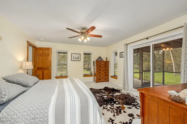 a view of outdoor space with deck and yard