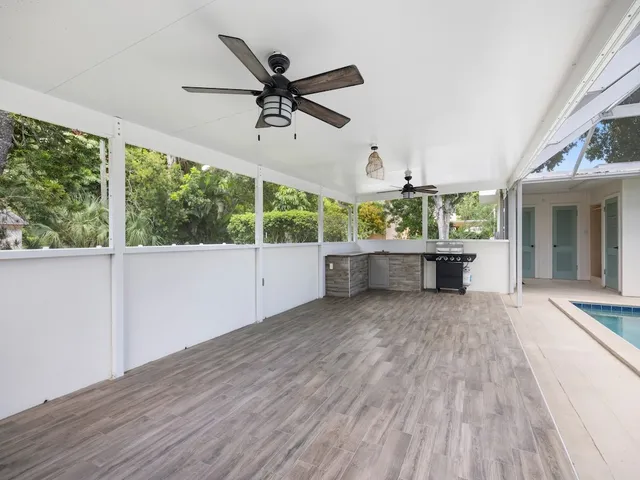 a kitchen with a stove and a sink