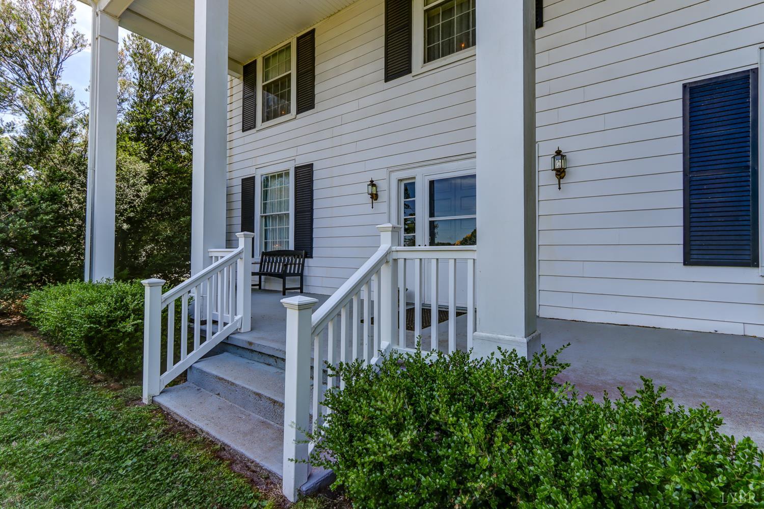 129 Lawyers Road Red House, VA 23963 - Photo 6 of 72 a view of a house with backyard and porch