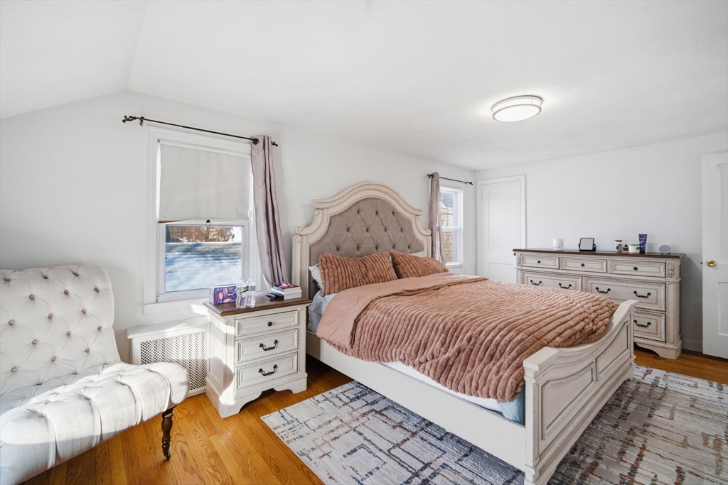 13 Bither Street Springfield, MA 01118 - Photo 16 of 29 a bedroom with a bed and a window